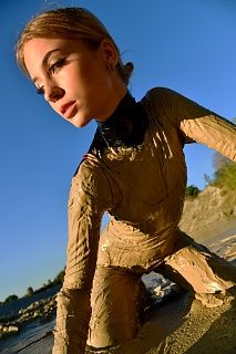 Muddy latexsuit