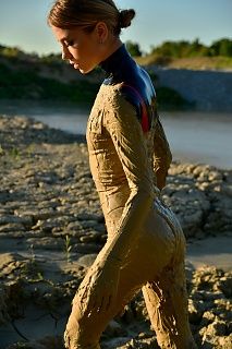 Muddy latexsuit